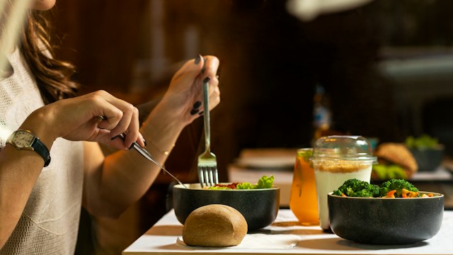 Fresh whole foods, fruits, vegetables, whole grains, and protein sources representing modern nutrition guidelines.